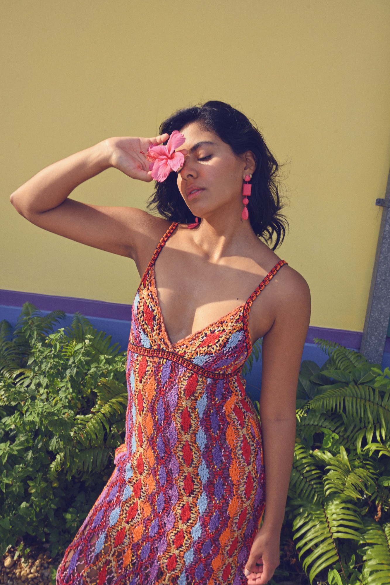 Crochet dress editorial, hibiscus, pink earrings, tropical color