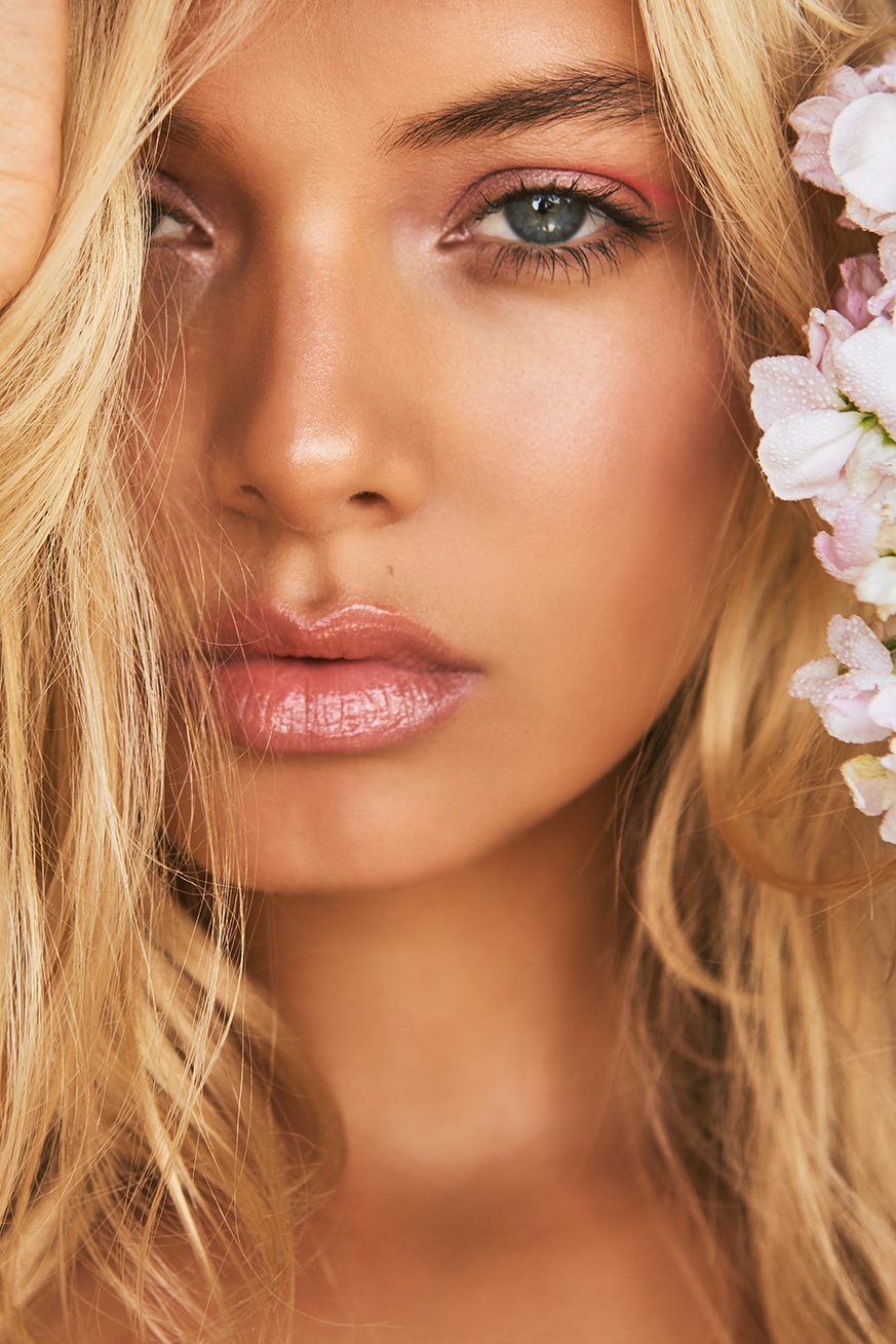Close-up portrait, soft light, editorial beauty