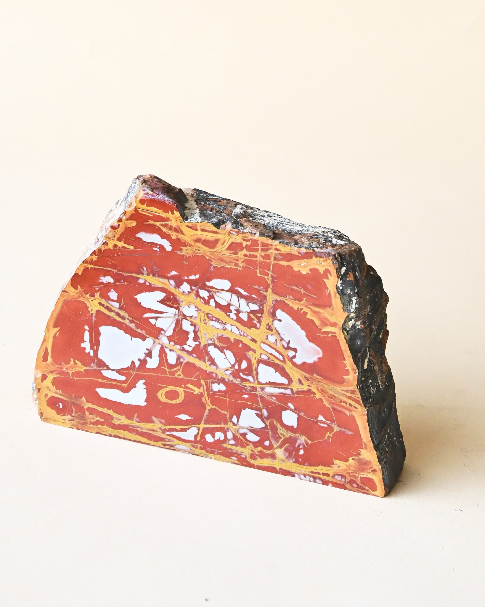 Noreena jasper slab, red and gold veining, polished face