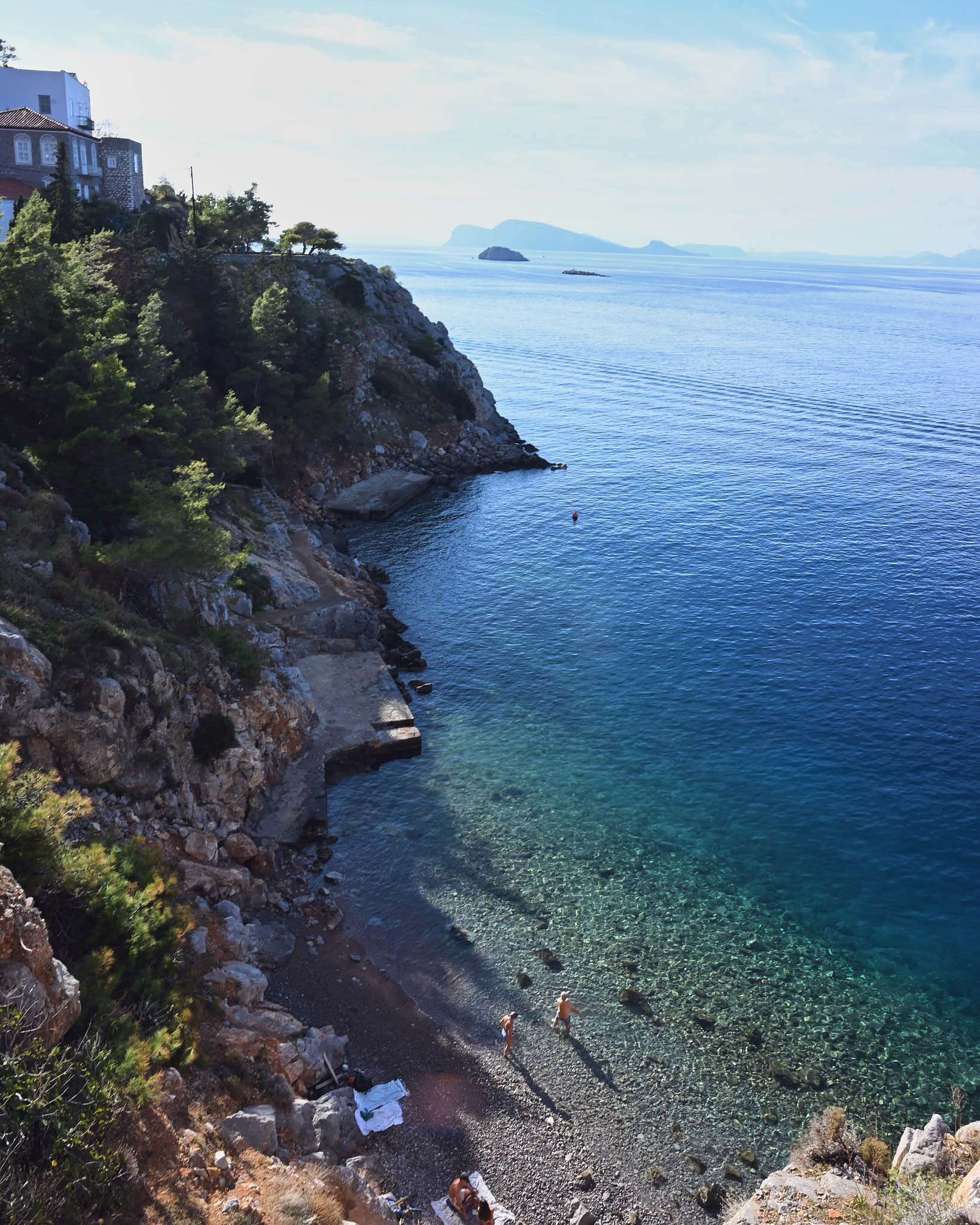 Hydra coastline, turquoise water, rocky cove